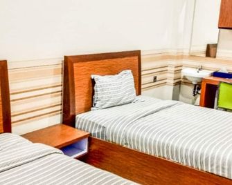 Pondok Indah Homestay by ecommerceloka - Samarinda - Soverom