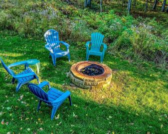 Wild Pines Cabin | Shared Waterfront w/ Bistro Lighting & Fire Pit - Rangeley - Patio