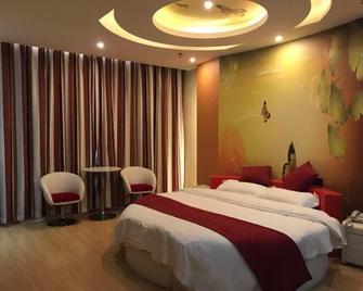 Thank Inn Hotel Anhui Suzhou Xiao County Zheshang Market - Suzhou - Bedroom