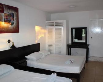 OYO Hotel Colibri - Четумаль - Спальня