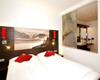zum Senner Suites Zillertal - Schlitters - Schlafzimmer