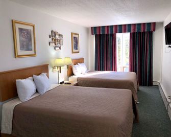Budget Host Inn - Ironwood - Bedroom