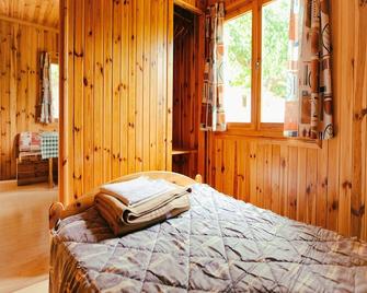 Charming Family Bungalow - La Puebla de Roda - Habitación