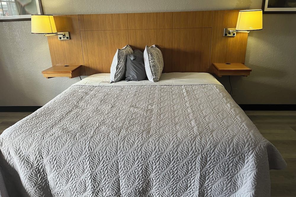 جو 2 إن آند سويتس باي ريليانس - سان انطونيو - غرفة نوم