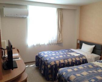 Hotel Grand Palace Shiogama - Shiogama - Спальня
