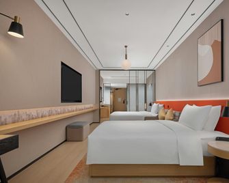 Hilton Garden Inn Chengdu Chunxi Road Center - Chengdu - Bedroom