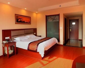 Greentree Inn Jiujiang Railway Station Qianhongxiang Hotel - Jiujiang - Bedroom