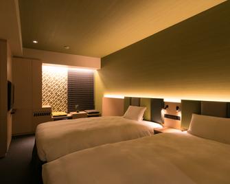 هاكاتا طوكيو راي هوتل - فوكوكا - غرفة نوم