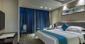 Changsha Zixin Hotel - צ'נגשה - חדר שינה