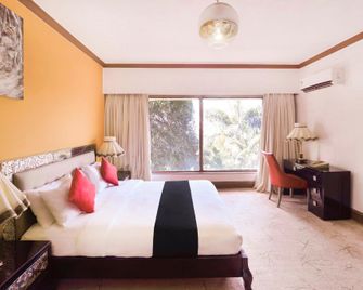 Townhouse Royal Palms Hotel - Daisy - מומבאי - חדר שינה