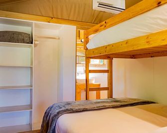 AfriCamps at Oakhurst - ווילדרנס - חדר שינה