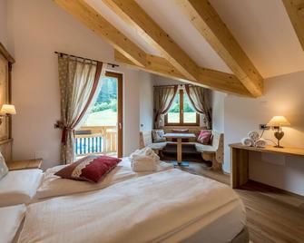 Tevini Dolomites Charming Hotel - Commezzadura - Slaapkamer