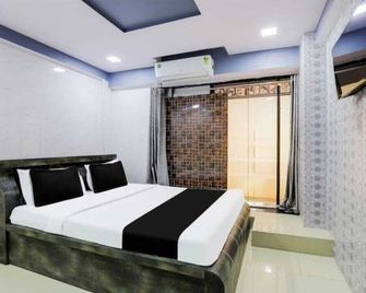 Hotel Delight In By Grb - Surat - Schlafzimmer