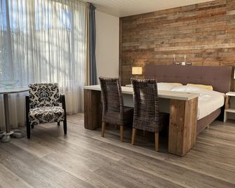 هوتل كيكدوين - دومبورغ - غرفة نوم