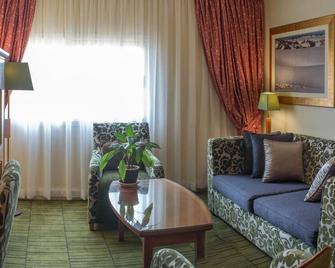 بيرمونت ميتكورت إن آت ذا جراند بالم - غابورون - غرفة معيشة