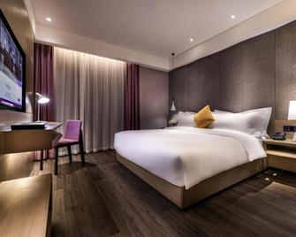 ميركيور سوتشو داونتاون - سوزهو - غرفة نوم