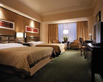 Golden Flower Hotel - שי-אן - חדר שינה