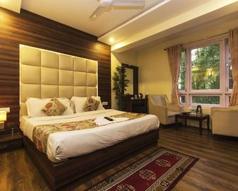 Jagjeet's Sikkim Retreat - גנגטוק - חדר שינה