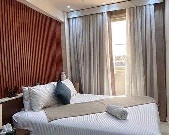 New Great Scarab Pyramids View - Madinat Coraya - Bedroom