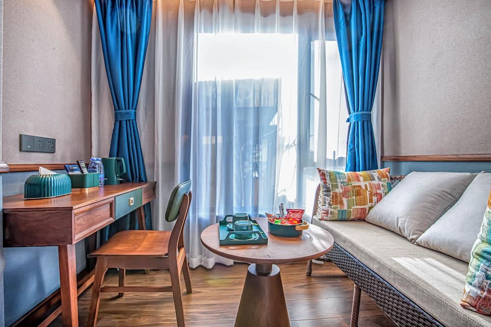 Nostalgia S Hotel(Kunming Dongfeng Square) - Kunming - Living room