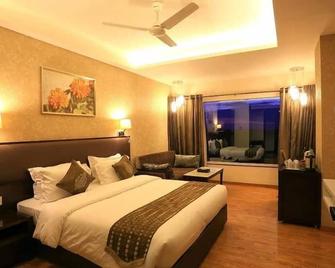Vista Rooms at Nandan Kanan - Dewas - Bedroom