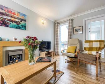 We love the upgrades made to this characterful 19th century cottage. - Dingwall - Living room