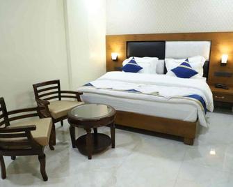 Hotel Grand Singhania - Ballia - Bedroom