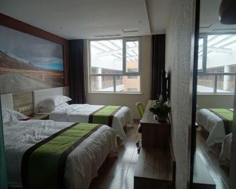 Ge Ri Hotel - Hainan - Habitación