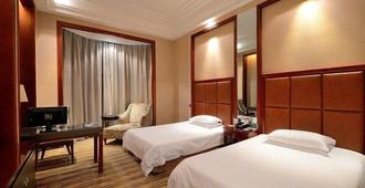 Xindu International Hotel - Taizhou - Bedroom