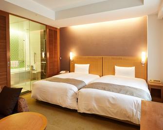 Pacific Hotel Okinawa - Naha - Schlafzimmer