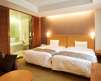 Pacific Hotel Okinawa - נאהא - חדר שינה