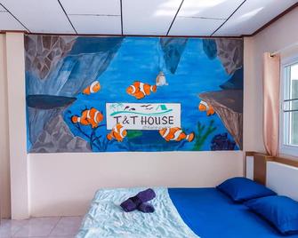 T and T house - Ko Payam - Schlafzimmer