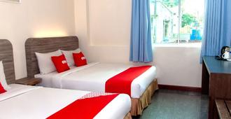 OYO 89609 Sandakan Central Hotel - Sandakan - Schlafzimmer