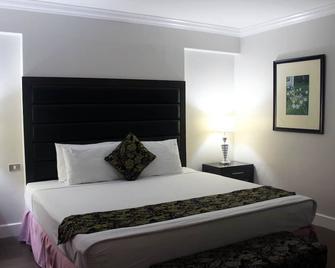 Fiesta Garden Hotel By Sms Hospitality - Bantay - Bedroom