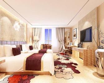 Shuangyu Business Theme Hotel (Kaifeng Drum Tower) - Kaifeng - Bedroom