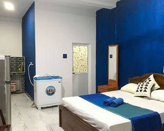 Girilena Guest House - Hikkaduwa - Bedroom