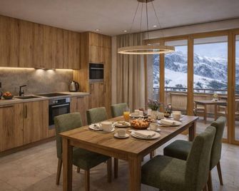 Kitzhorn Suites - St. Johann in Tirol - Comedor