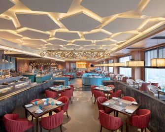 راديسن بلو تاورز كاوشامبي دلهي إن سي آر - غازي اباد - مطعم