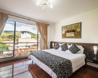 Casablanca Hotel, RestoBar, Catering, Eventos & Turismo en Garzón - Garzón - Habitación