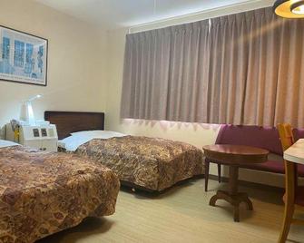 Hotel Kamomekan - Hakodate - Schlafzimmer