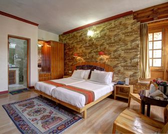 Hotel Spic N Span - 列城 - 臥室