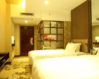 Kelly Hotel (Qinzhou Nianfeng Square) - Qinzhou - Спальня