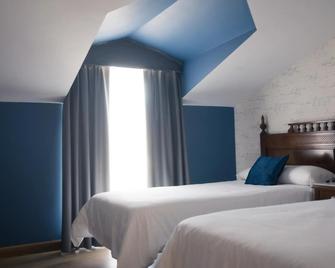 Hotel Cueli - Viveda - Schlafzimmer