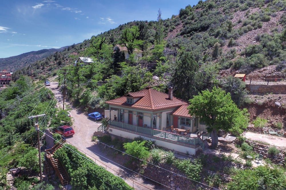 Outdoors view view of The John Riordan House. Built 1898. Vacant, Buried For 60 Years, Restored 2012