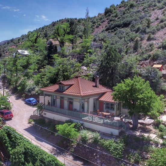 Outdoors view view of The John Riordan House. Built 1898. Vacant, Buried For 60 Years, Restored 2012