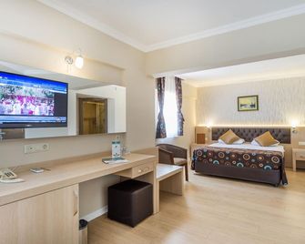 هوتل أسدم بارك - كمر - غرفة نوم