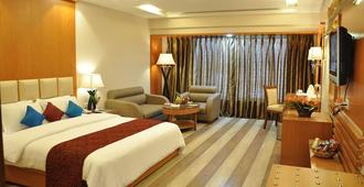 Hotel Babylon Inn - Raipur - Camera da letto