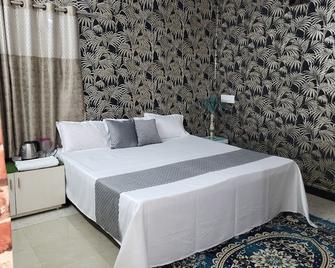 Suraj Village Resort - Удджайн - Спальня