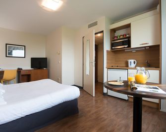 Comfort Aparthotel Saint-Nazaire Les Portes de l'Océan - Сен-Назер - Спальня