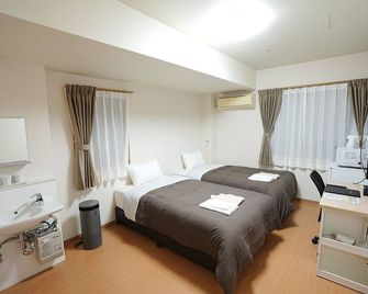 Natural Hot Spring Hotel Kinshay - Isahaya - Camera da letto